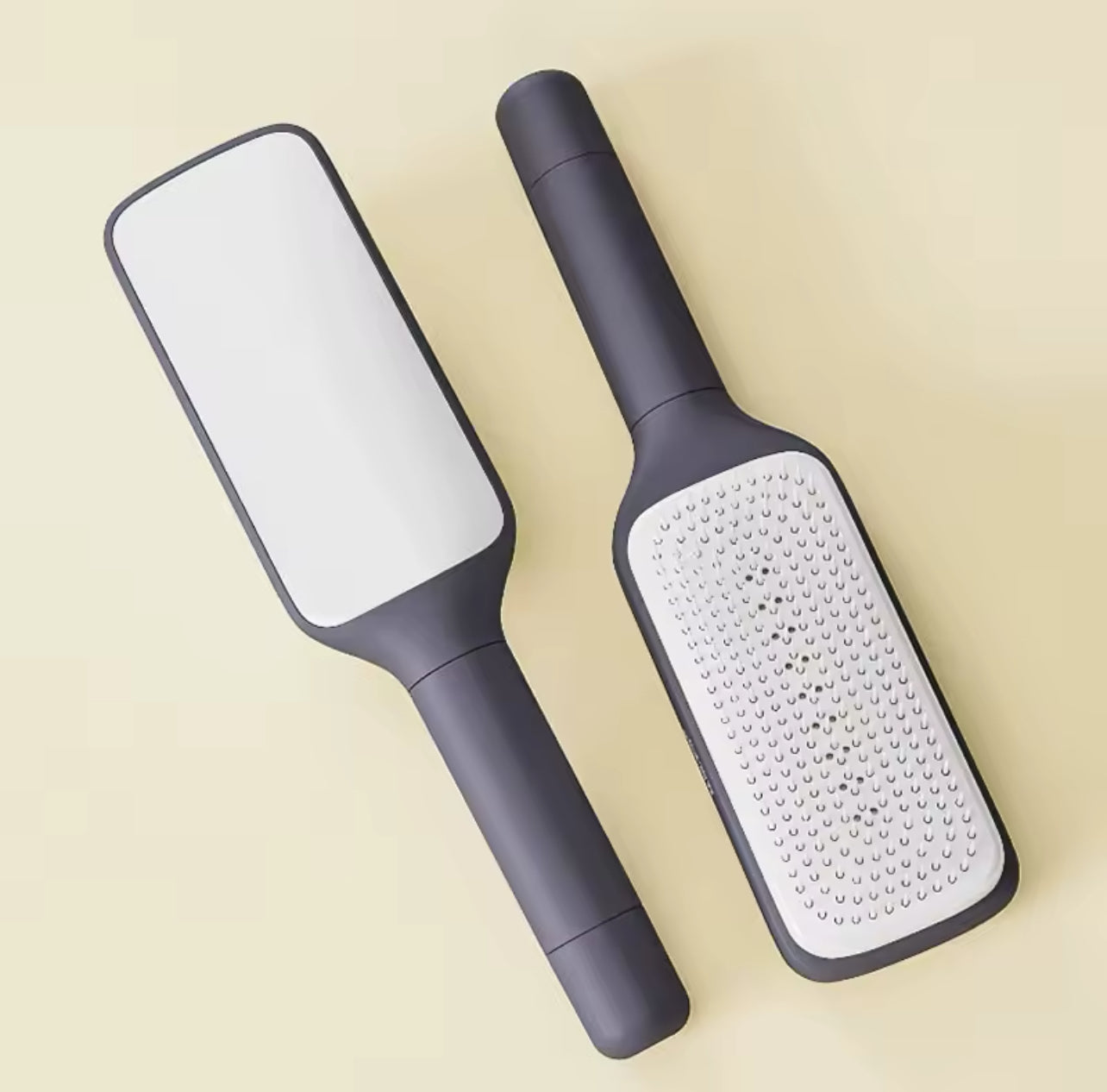 Brosse à cheveux rotative autonettoyante