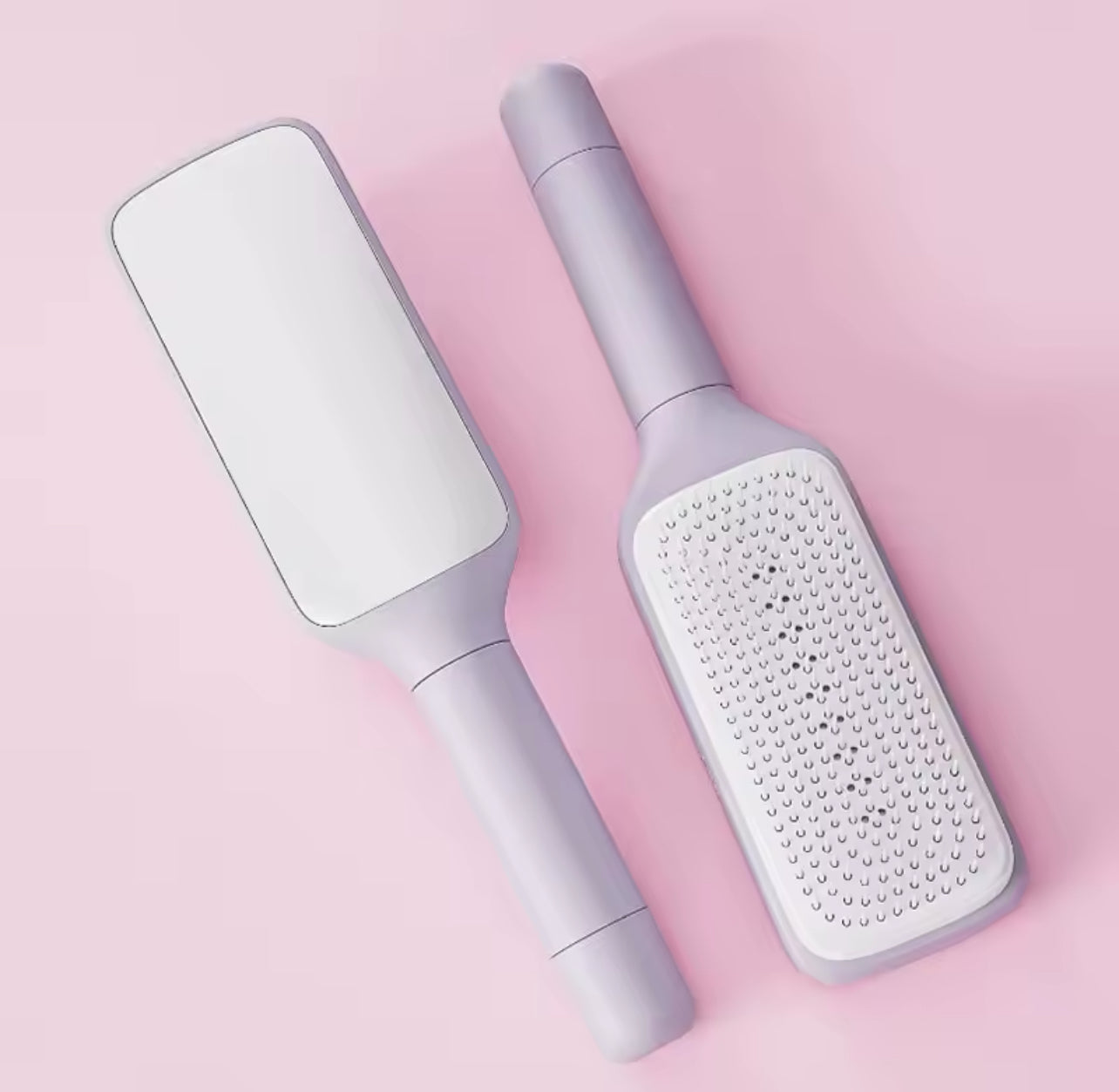 Brosse à cheveux rotative autonettoyante